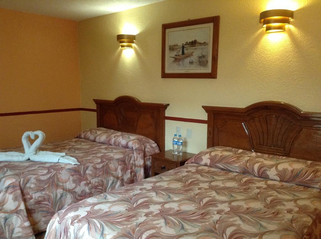 Hotel Real Del Valle Сан-Кристобаль-де-Ла-Касас Номер фото